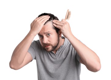 Man with hair loss problem on white background