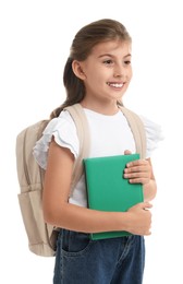 Portrait of cute girl with backpack and book on white background