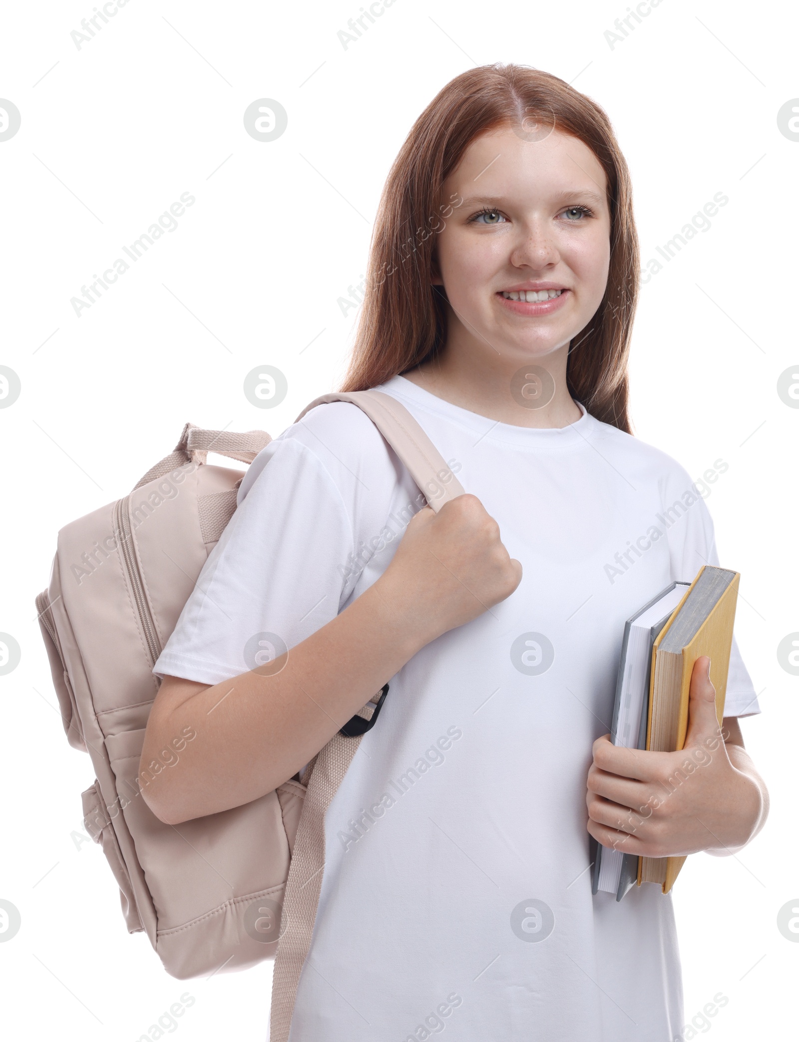 Photo of Teenage girl with backpack and books on white background