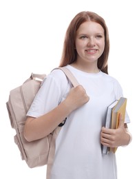 Teenage girl with backpack and books on white background