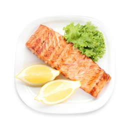 Photo of Delicious grilled salmon fillet with lemon and lettuce isolated on white, top view