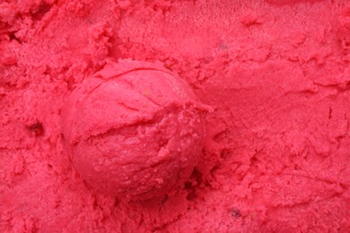 Tasty berry sorbet as background, closeup. Space for text