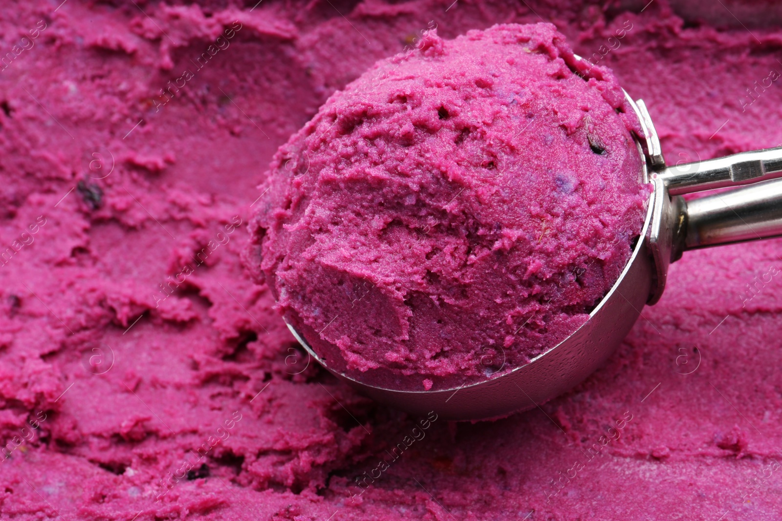 Photo of Scoop of tasty berry sorbet, closeup view