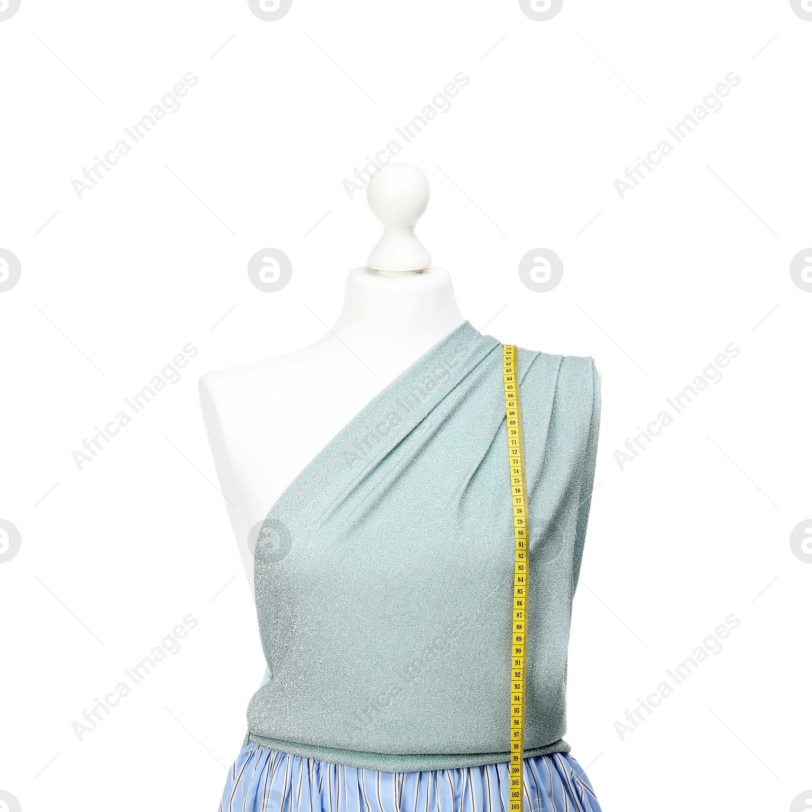 Photo of Mannequin with skirt, shirt and measuring tape isolated on white. Creating new outfit