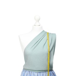 Photo of Mannequin with skirt, shirt and measuring tape isolated on white. Creating new outfit