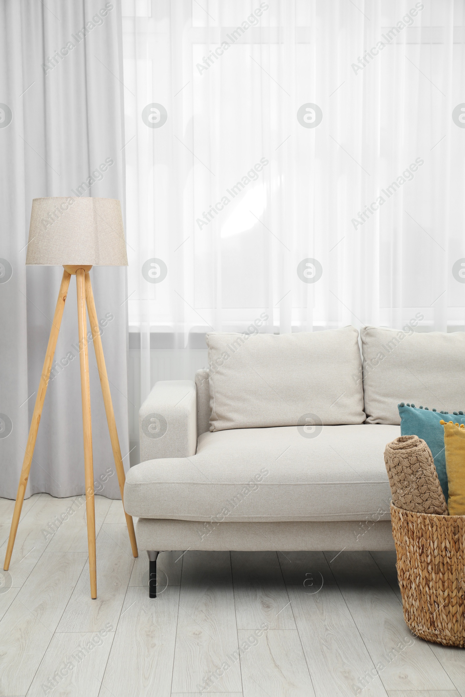 Photo of Comfortable couch in living room. Interior design