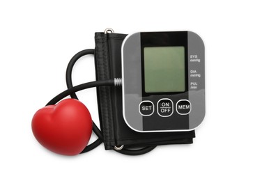 Photo of Blood pressure monitor and red decorative heart isolated on white, top view