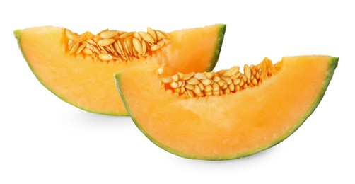 Slices of Cantaloupe melon isolated on white