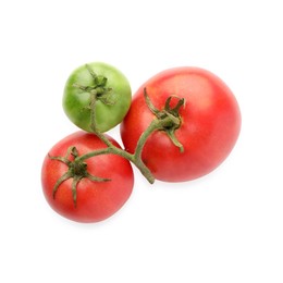 Photo of Branch with ripe and unripe pink tomatoes isolated on white, top view