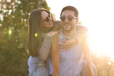 Photo of Beautiful couple having fun together in autumn park