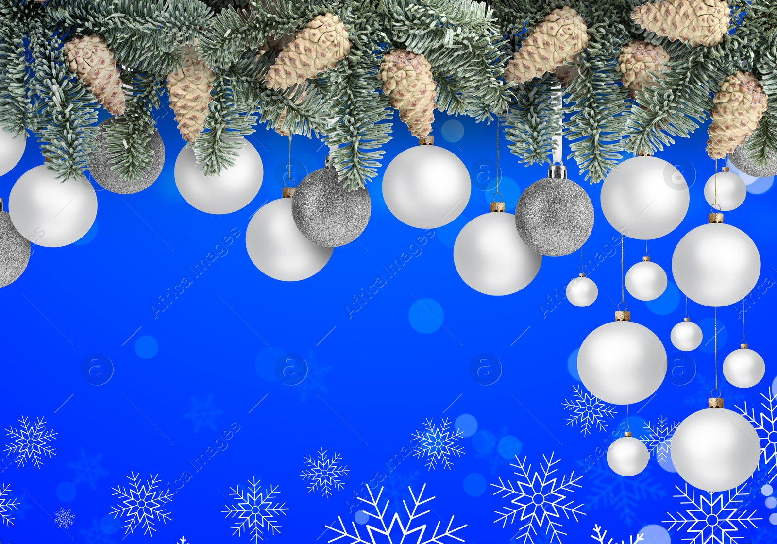 Image of Fir tree branches with festive balls and snowflakes on blue background. New Year and Christmas greeting card design with space for text