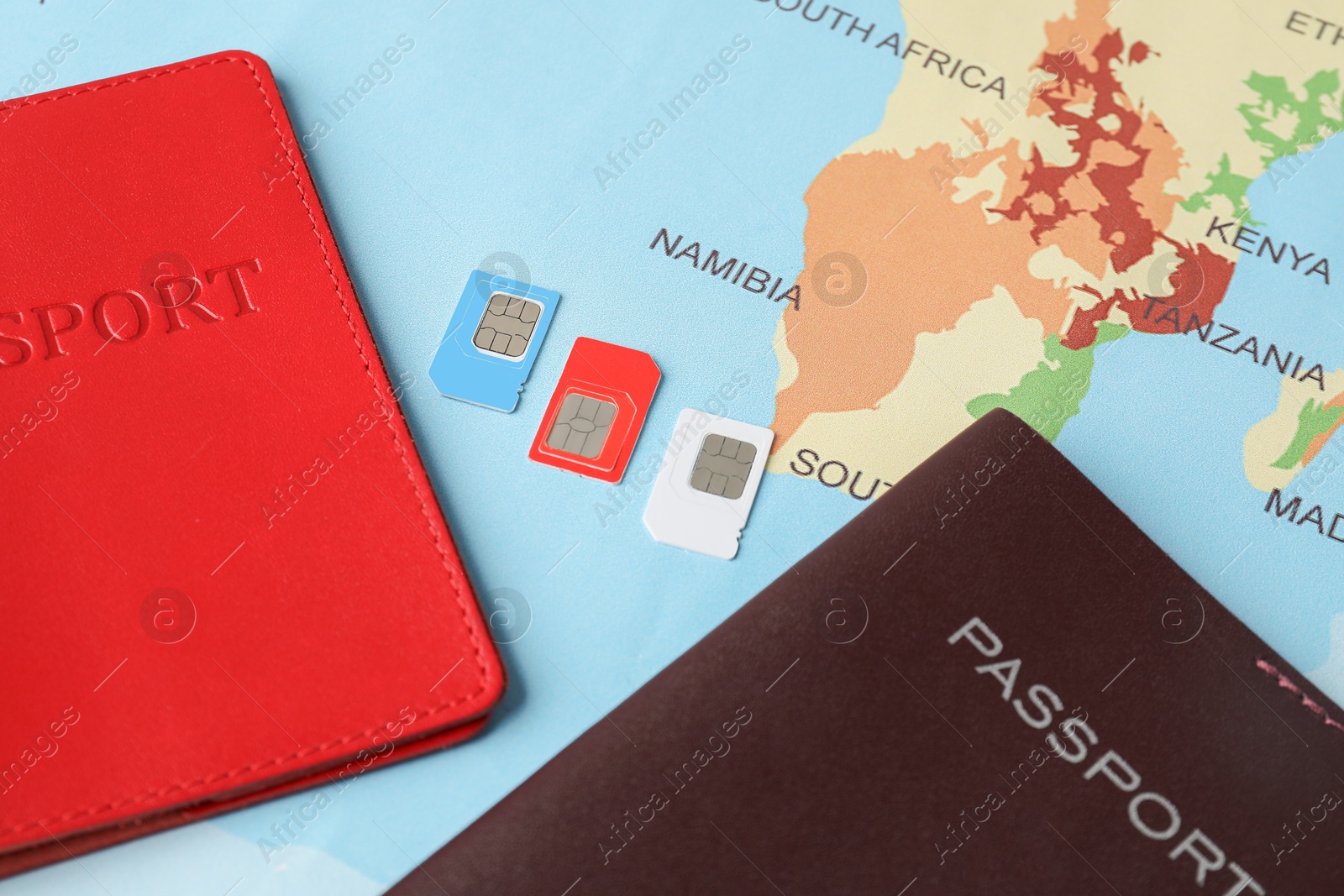 Photo of Passports and SIM cards on world map