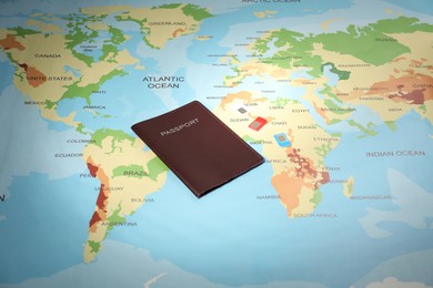 Photo of Modern SIM cards and passport on world map