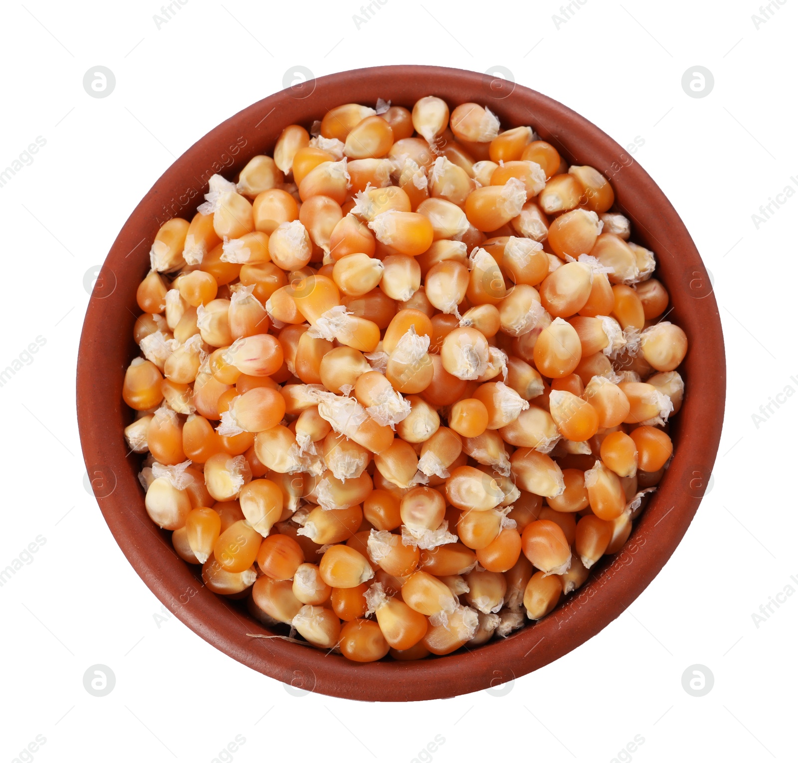 Photo of Fresh corn kernels in bowl isolated on white, top view