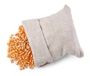 Fresh corn kernels and overturned burlap sack isolated on white, top view