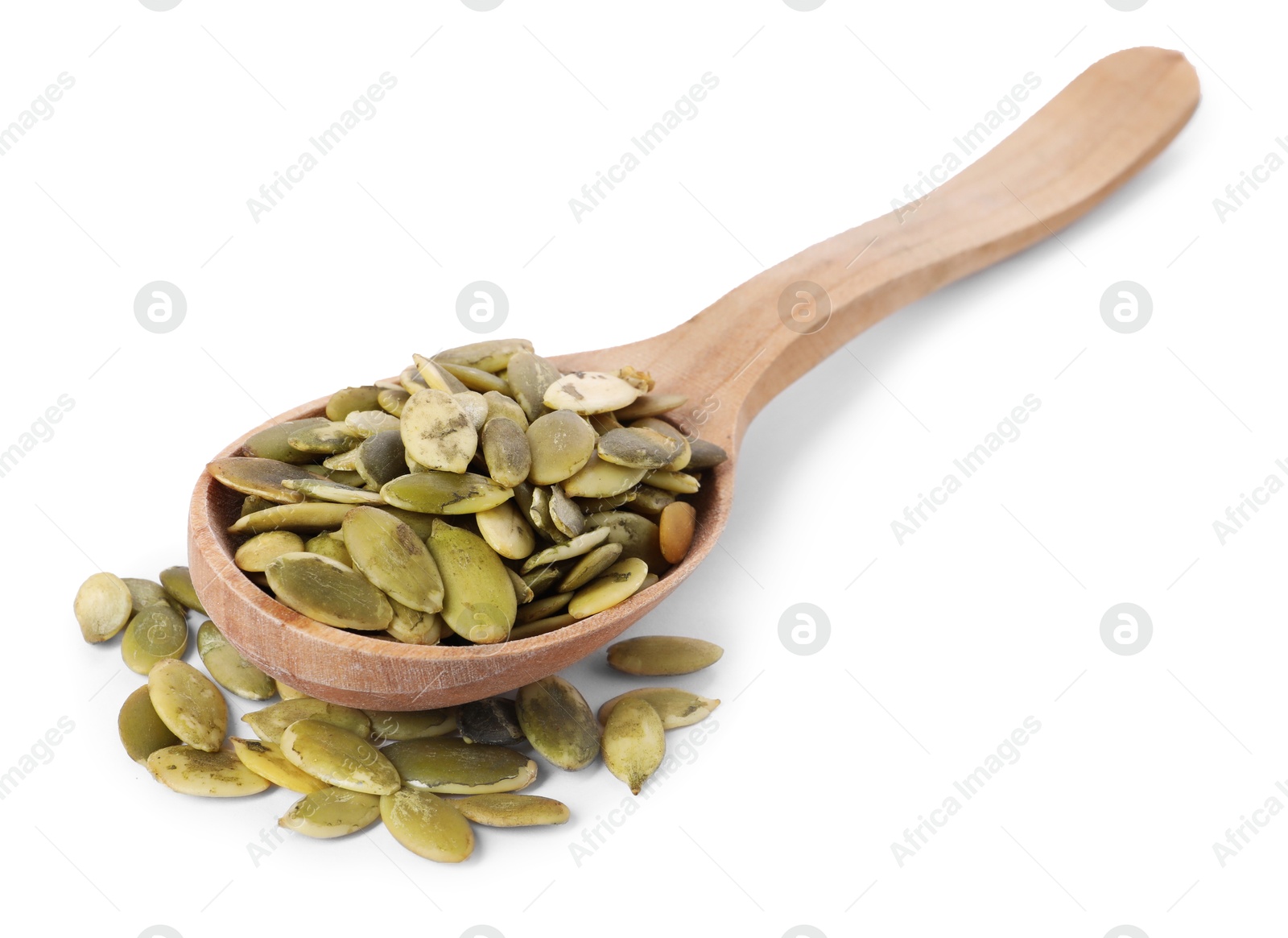 Photo of Peeled pumpkin seeds in wooden spoon isolated on white