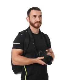 Photographer with backpack and camera on white background