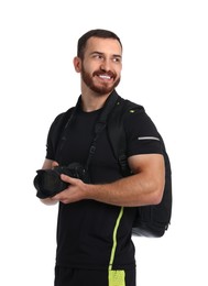 Photographer with backpack and camera on white background