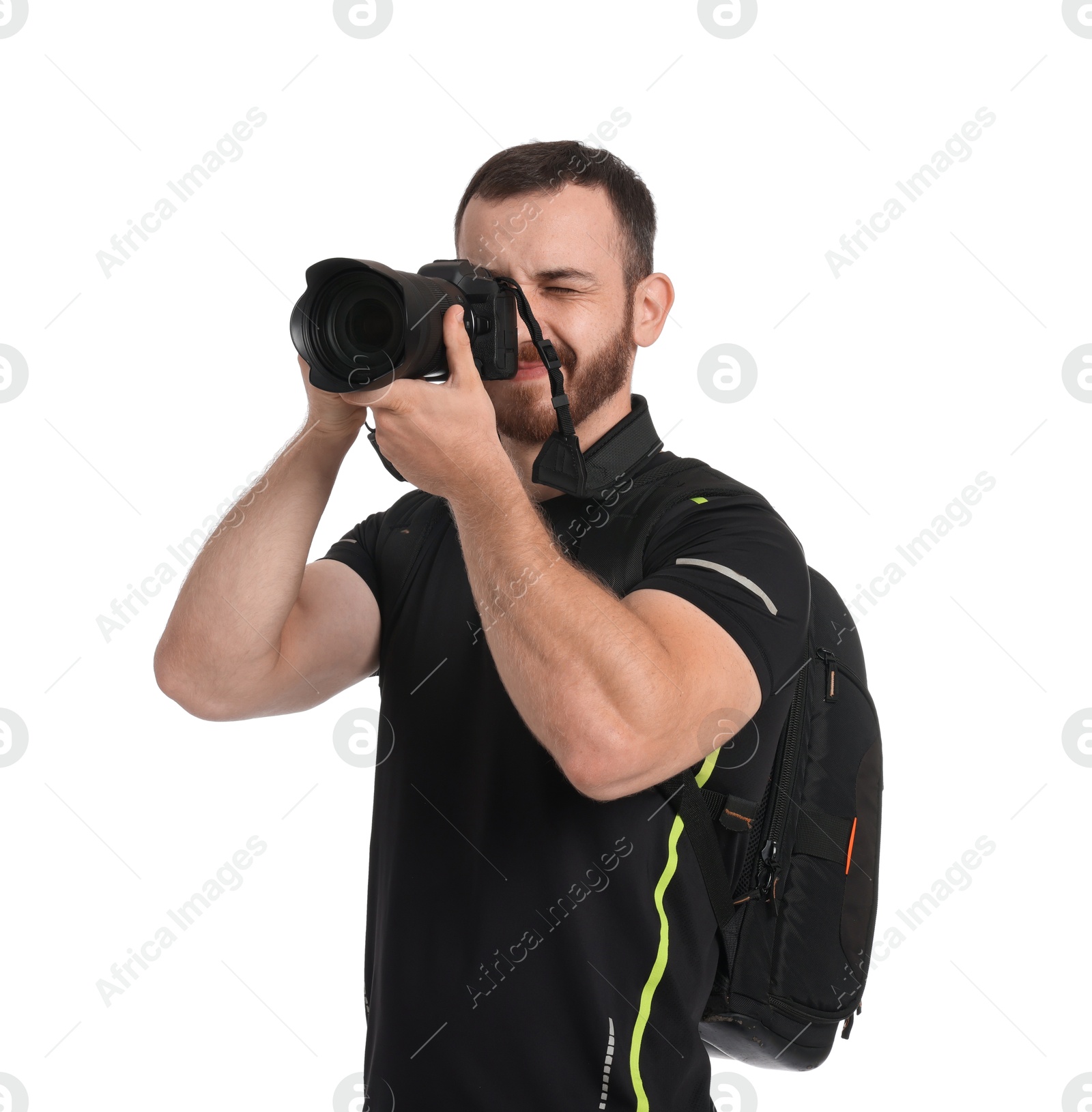 Photo of Photographer with backpack and camera taking picture on white background