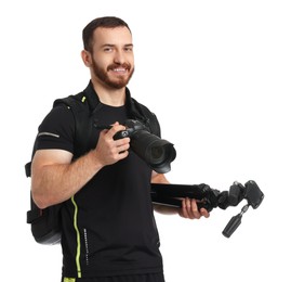 Photographer with backpack, tripod and camera on white background