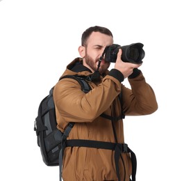 Photo of Photographer with backpack and camera taking picture on white background