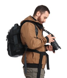 Photo of Photographer with backpack and camera on white background