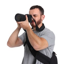 Photographer with backpack and camera taking picture on white background