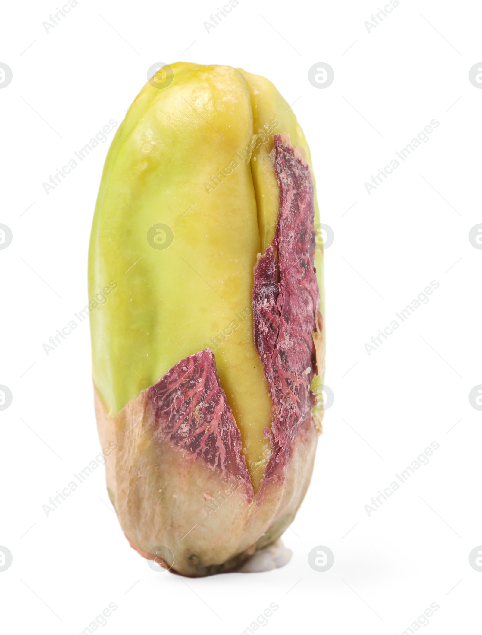 Photo of One peeled pistachio nut isolated on white