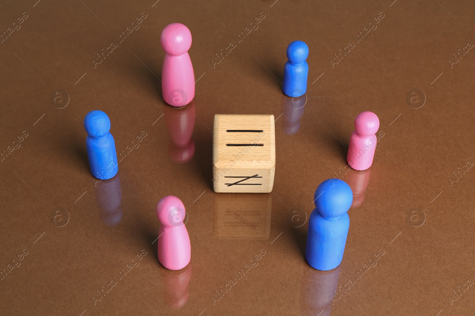 Photo of Gender equality concept. Male and female figures on brown background, above view