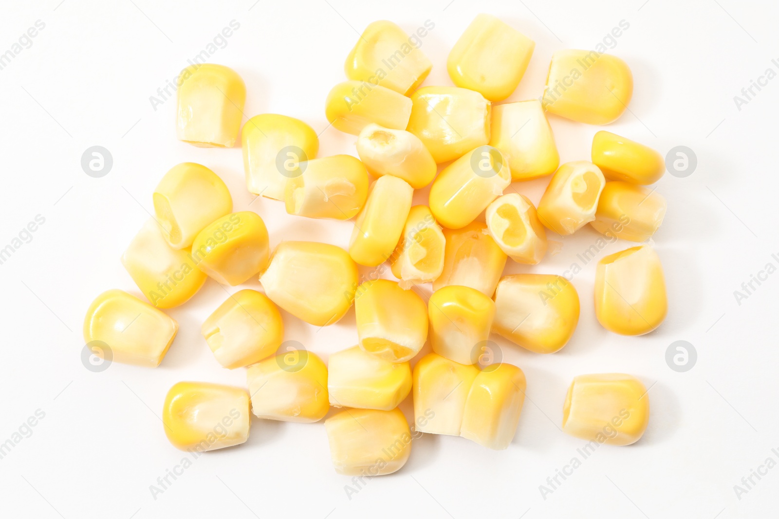 Photo of Pile of fresh corn kernels on white background, flat lay