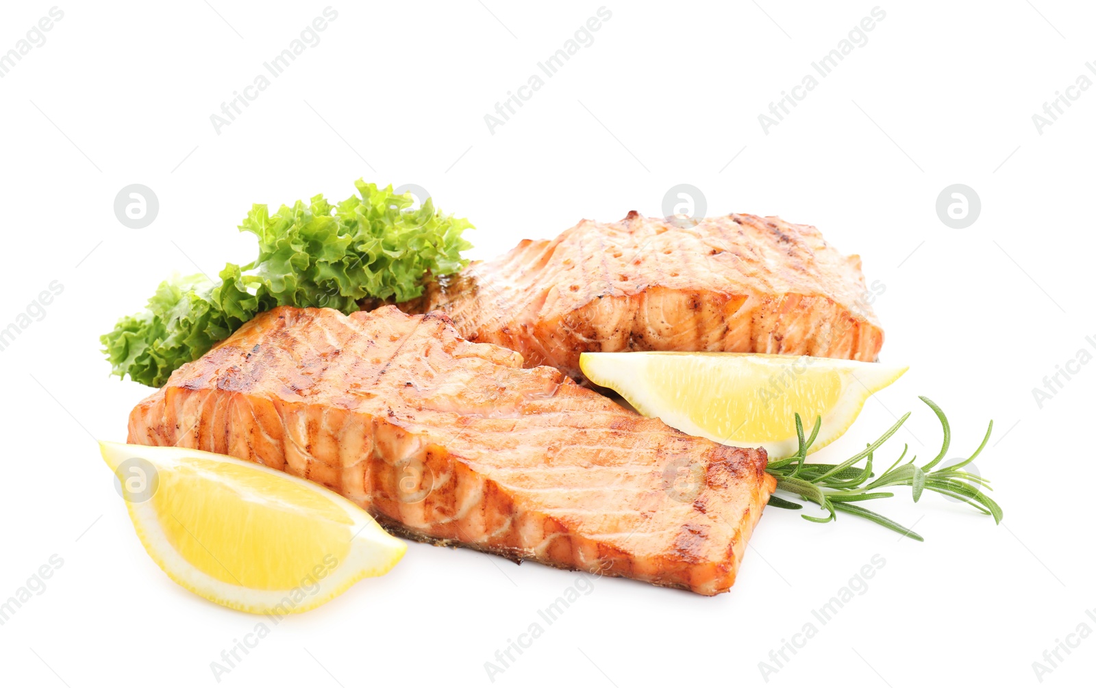 Photo of Delicious grilled salmon fillets with lemon, rosemary and lettuce isolated on white