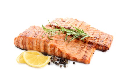 Photo of Delicious grilled salmon fillets with peppercorns, lemon and rosemary isolated on white