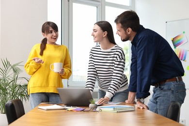 Group of designers working together in office