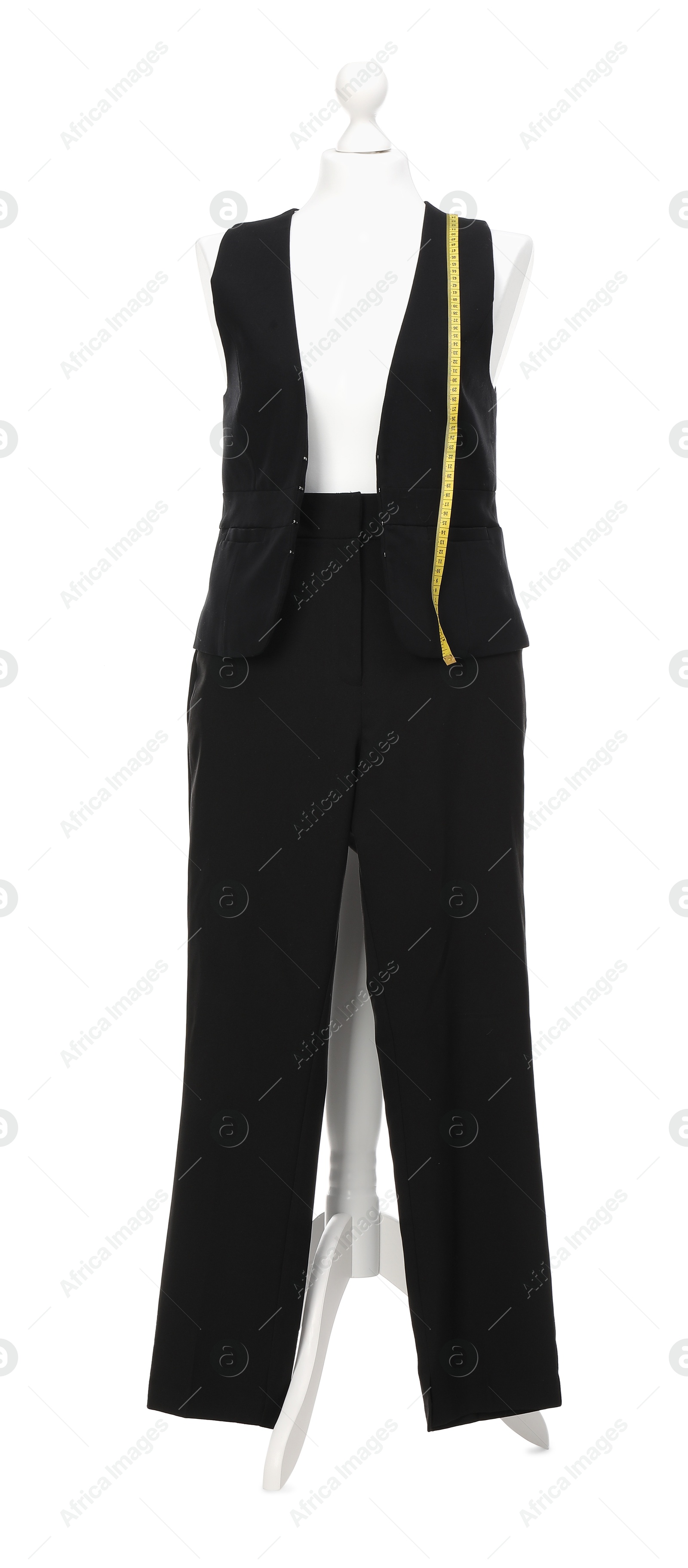 Photo of Mannequin with new stylish suit and measuring tape isolated on white