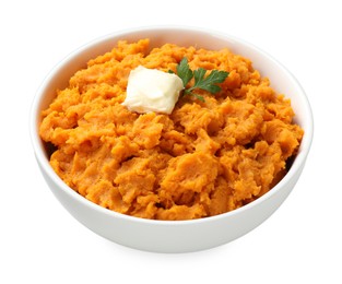 Photo of Delicious mashed sweet potatoes with butter and parsley in bowl isolated on white