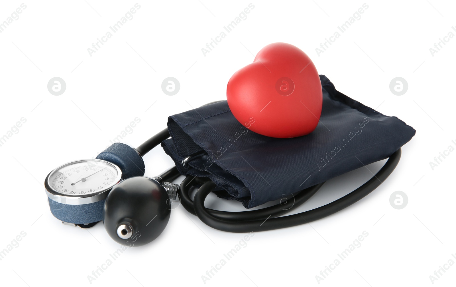 Photo of Blood pressure measuring device and red decorative heart isolated on white