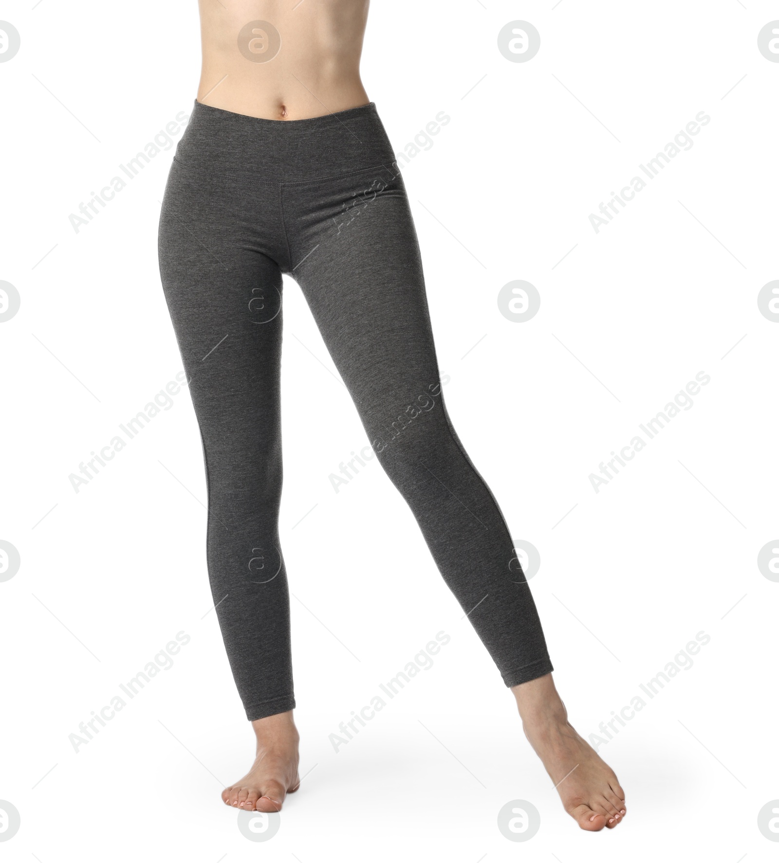 Photo of Woman wearing sports leggings on white background, closeup