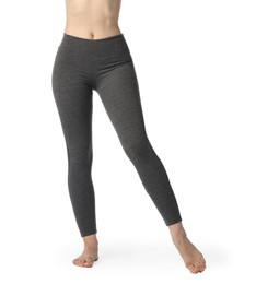 Photo of Woman wearing sports leggings on white background, closeup