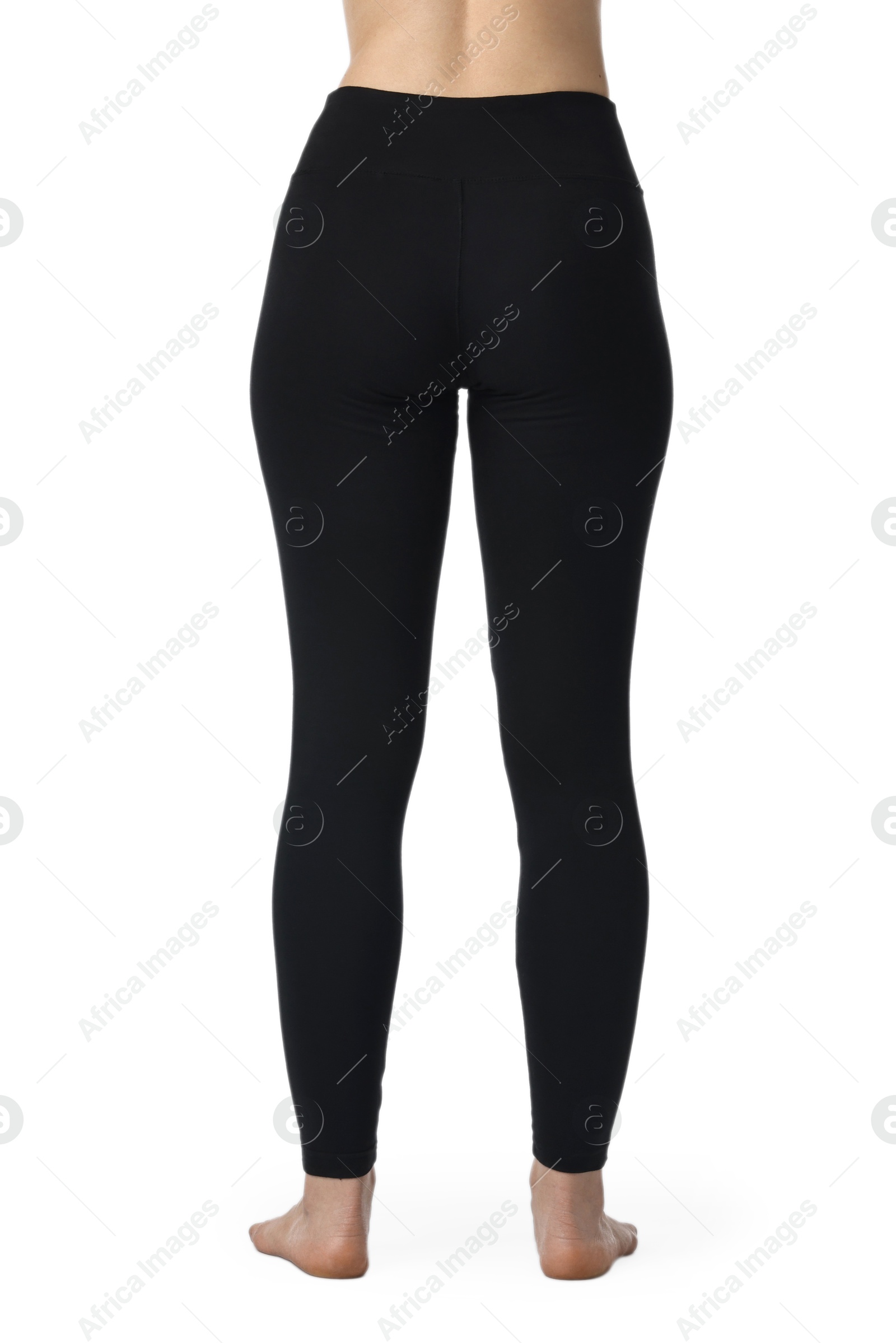 Photo of Woman wearing black sports leggings on white background, closeup