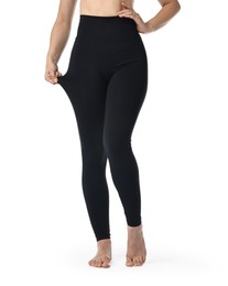 Photo of Woman wearing black sports leggings on white background, closeup