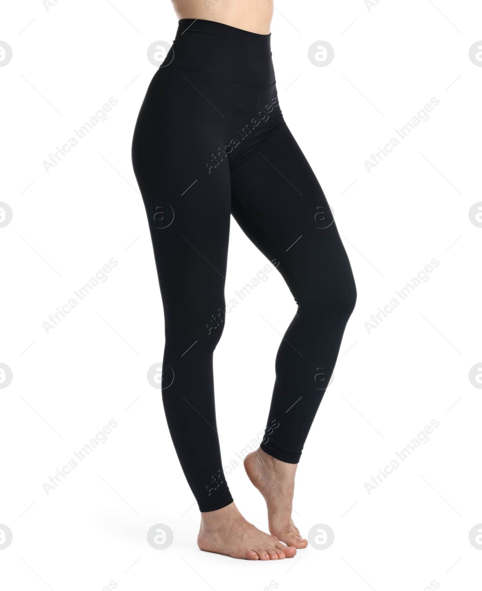 Photo of Woman wearing black sports leggings on white background, closeup