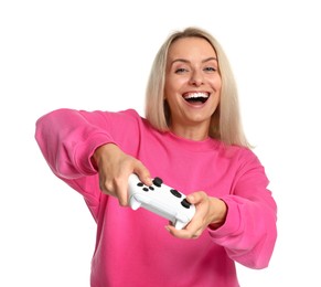 Happy woman playing video games with controller on white background