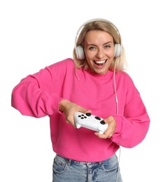 Photo of Happy woman in headphones playing video games with controller on white background