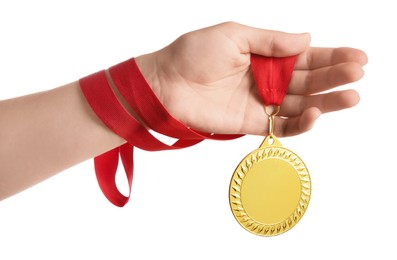 Photo of Woman with golden medal on white background, closeup