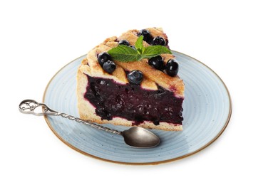 Photo of Slice of delicious homemade blueberry pie with mint isolated on white