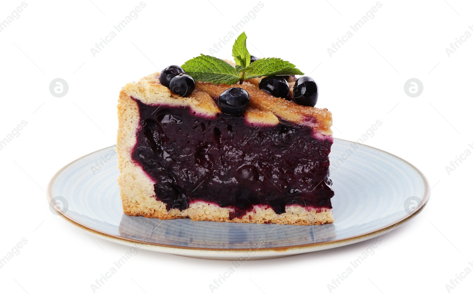 Photo of Slice of delicious homemade blueberry pie with mint isolated on white