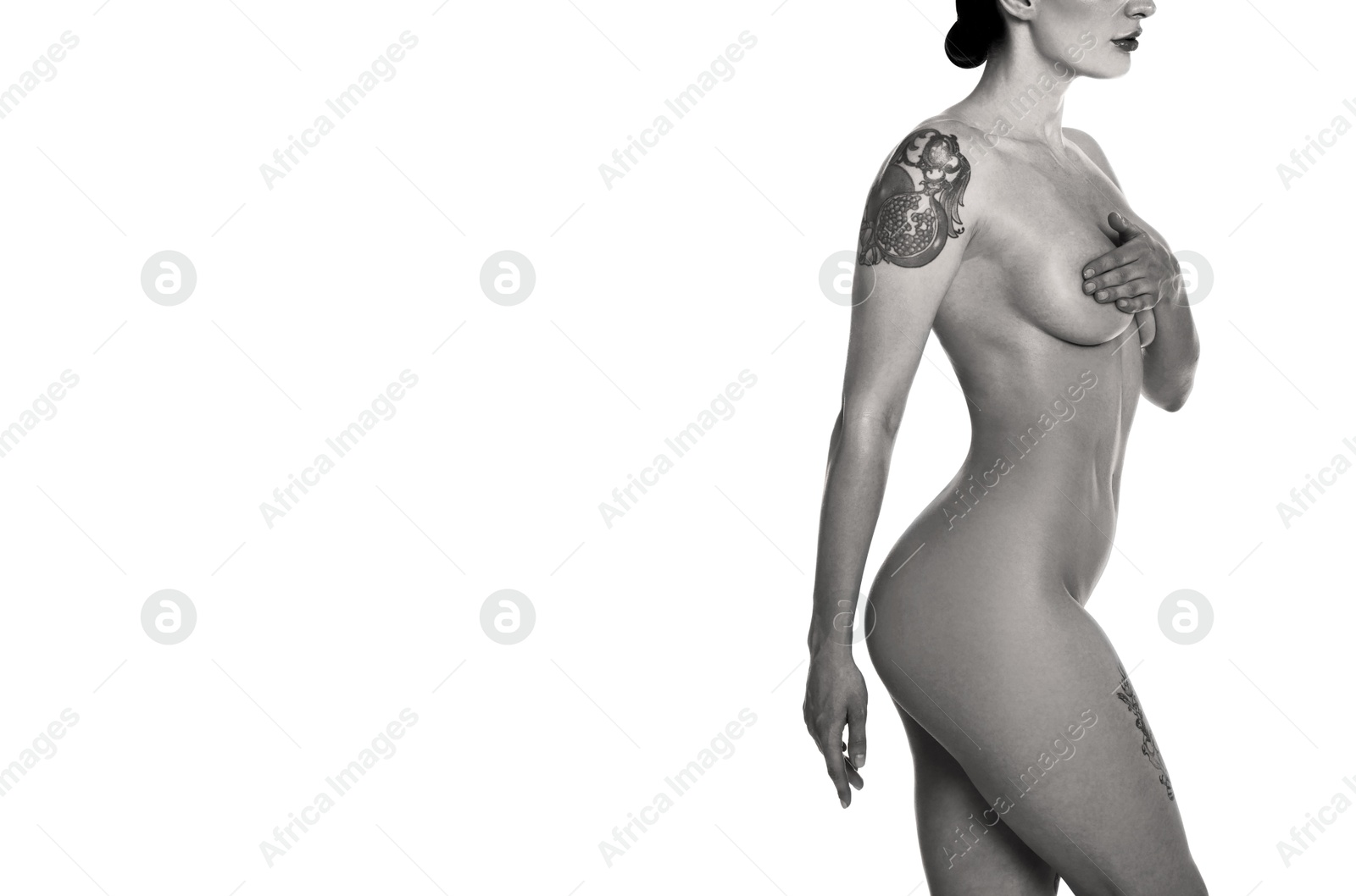 Image of Beautiful nude woman posing on white background, closeup. Black and white effect