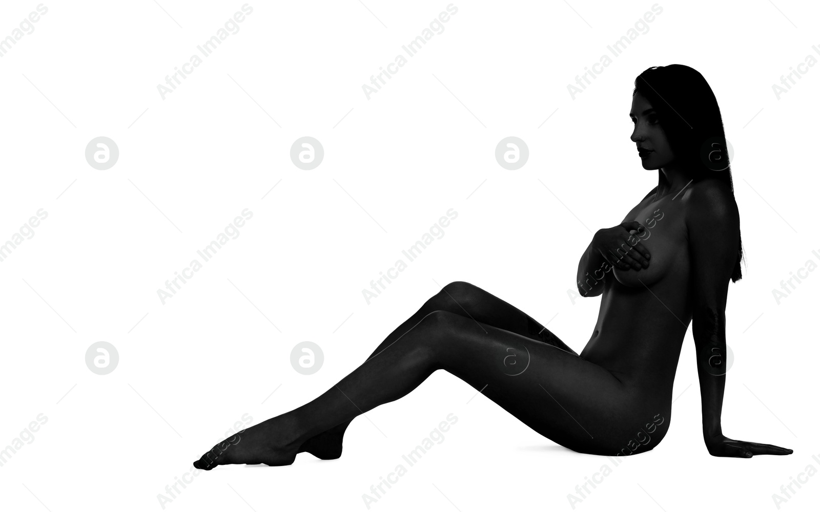 Image of Beautiful nude woman posing on white background. Black and white effect