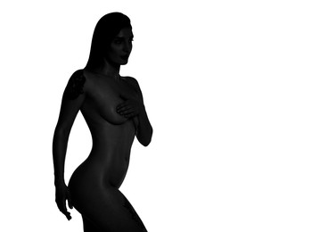 Image of Beautiful nude woman posing on white background. Black and white effect