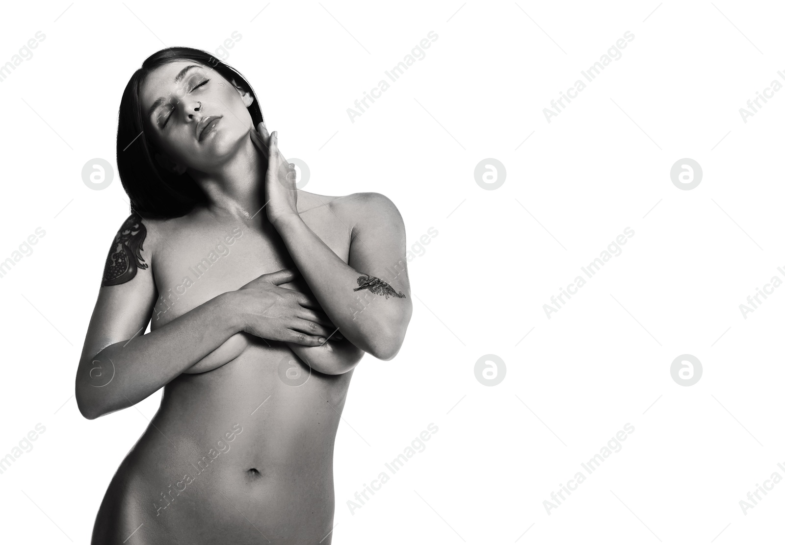 Image of Beautiful nude woman posing on white background. Black and white effect